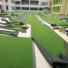 Can you lay artificial grass on grass?